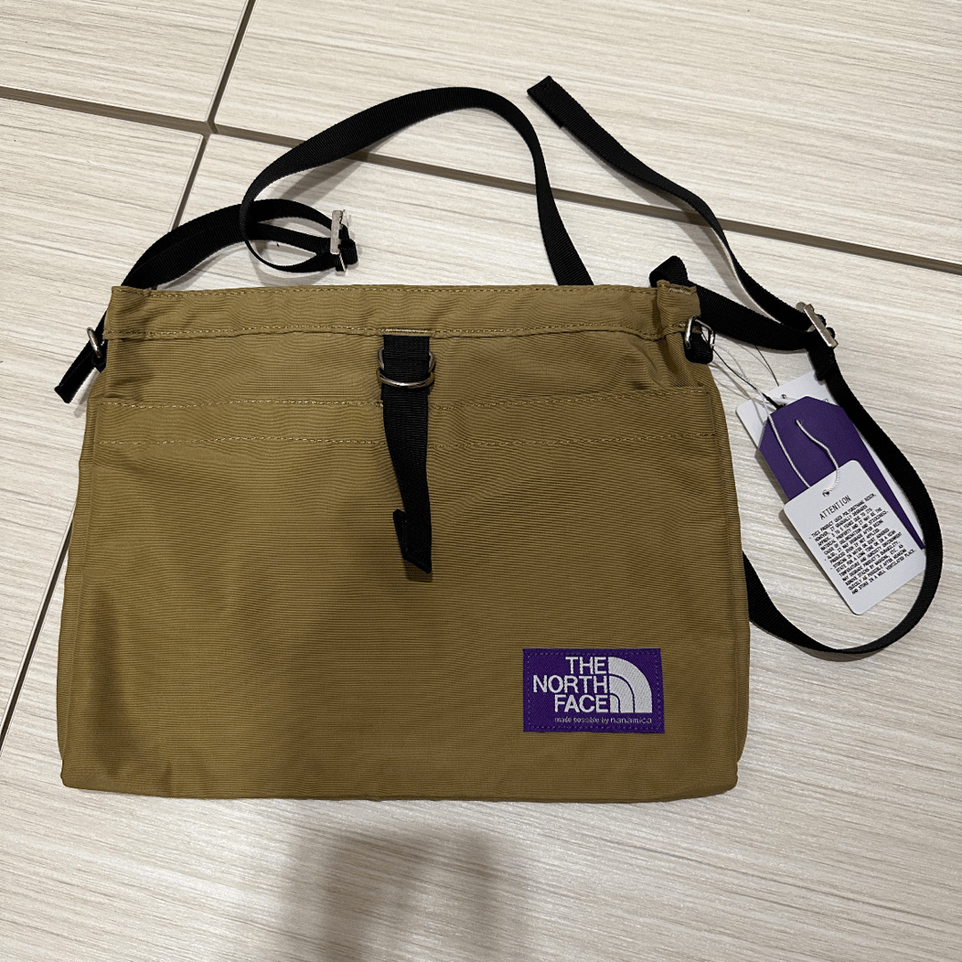 North face purple hot sale label shoulder bag